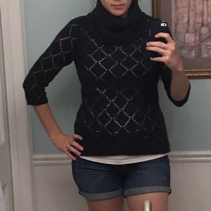 Open weave three quarter sleeve knit sweater